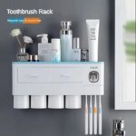 MENGNI Magnetic Adsorption Inverted Toothbrush Holder Wall Automatic Toothpaste Squeezer Storage Rack - Bathroom Accessory